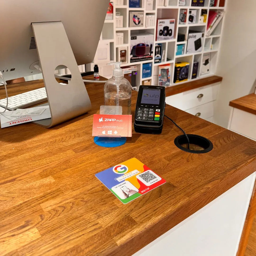 Colourful NFC Table Plate displayed at Isleworth IT services shop for instant customer reviews and online engagement