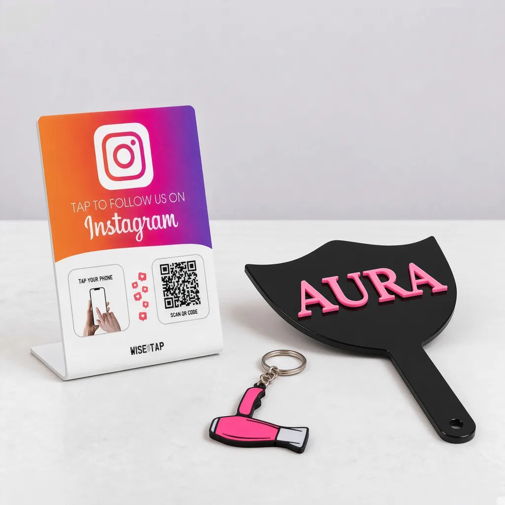 WiseTap Hair Salon Social Starter with an Instagram NFC stand, handheld acrylic logo mirror and pink hair dryer NFC keychain