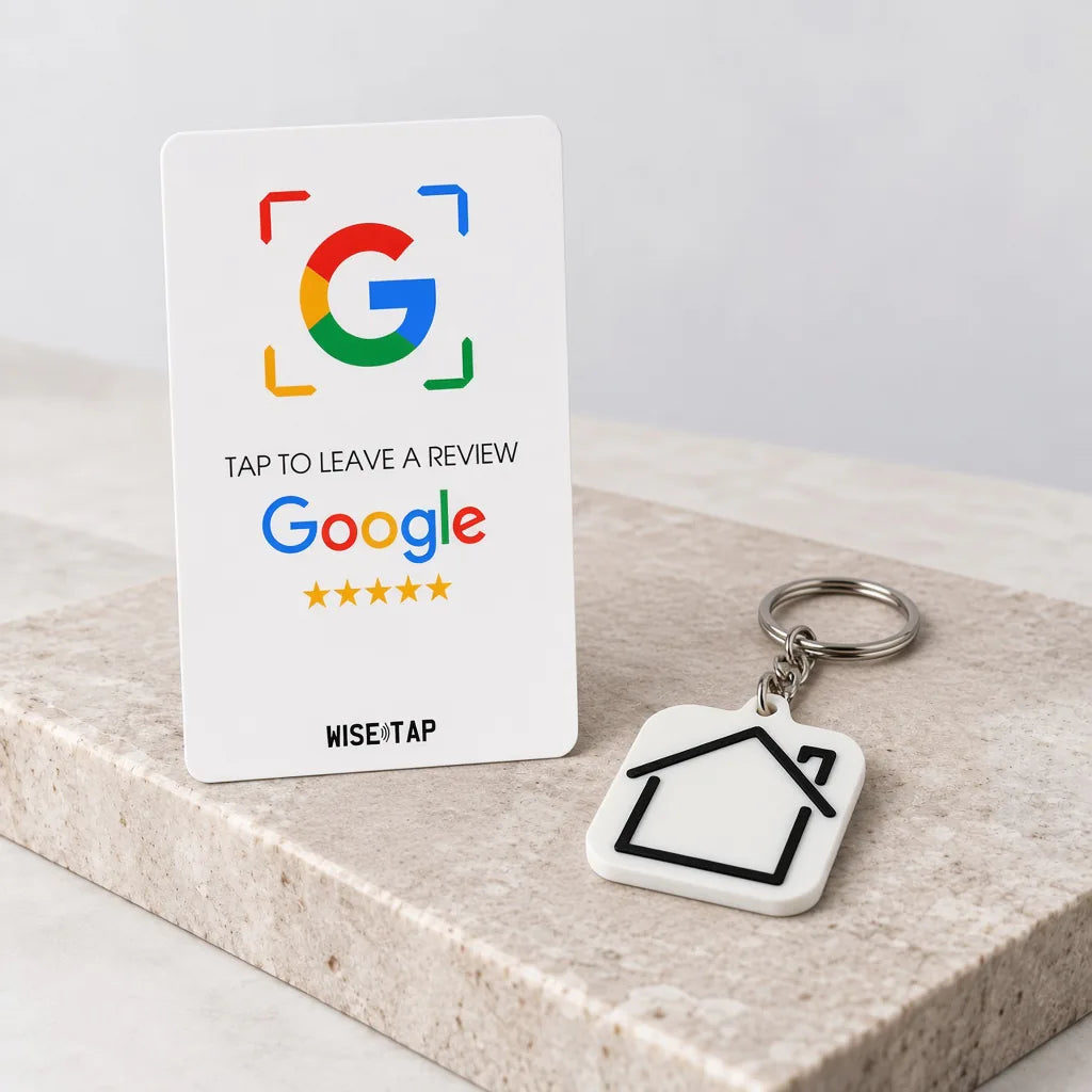 WiseTap Starter Kit Lite with a Google NFC review card and a House NFC keychain on a marble counter